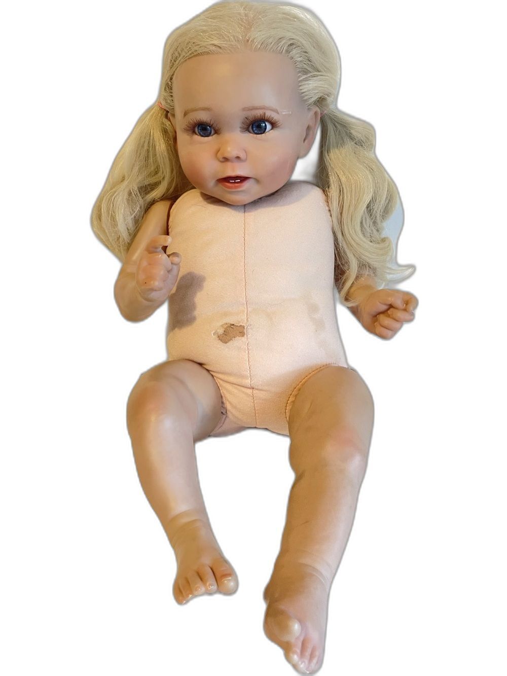 RBG Realistic Baby Doll with Blonde Hair and Peach Fabric Body